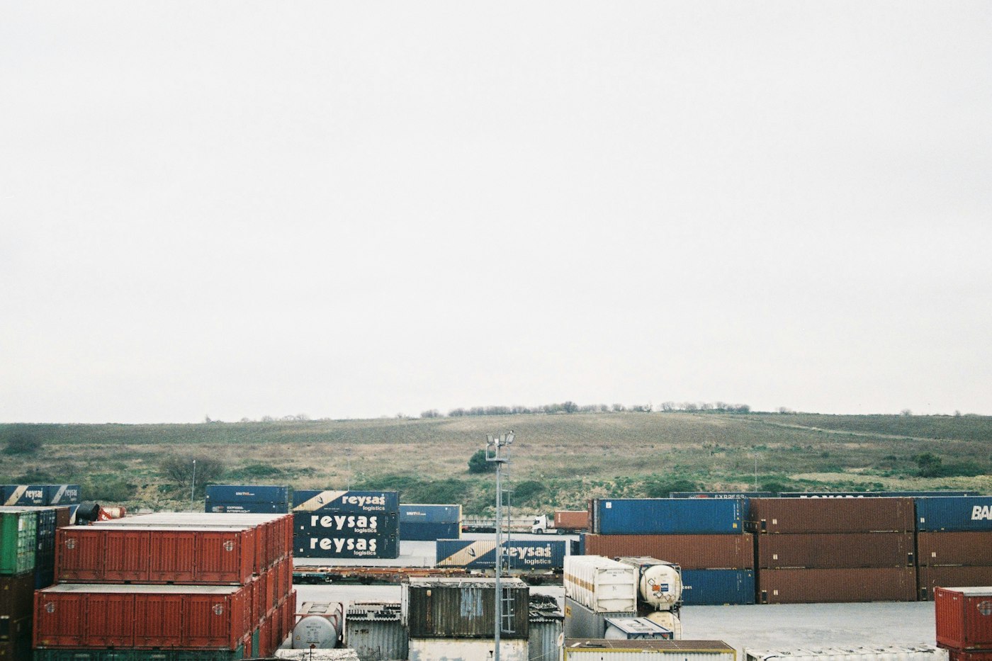 Illustrative photograph of shipping containers in an outdoor yard